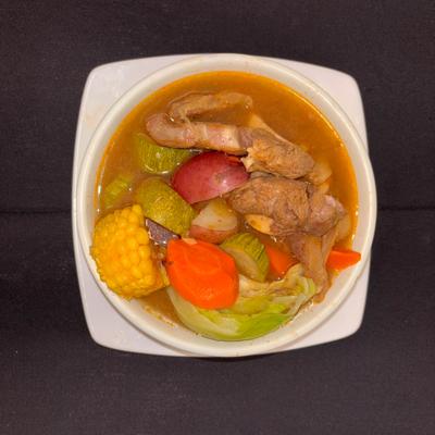 Beef soup with various vegetables, top view.