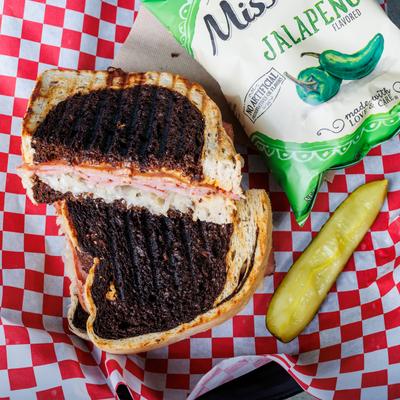 City Reuben, pickle spear and jalapeno chips.