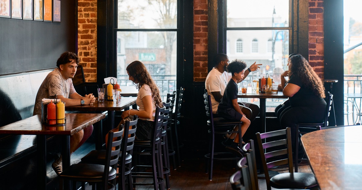 Interior, diner area, tables, chairs, guests