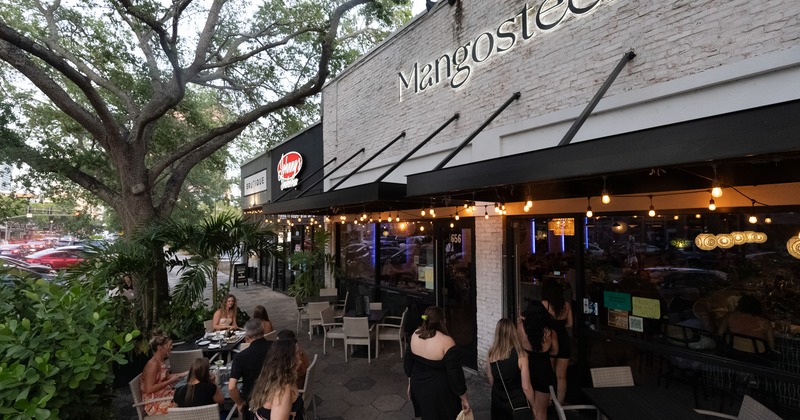 Exterior, front view to restaurant and side walk patio