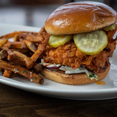 Nashville Chicken sandwich with fries.