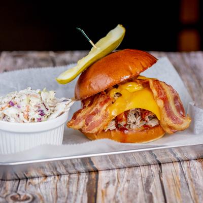 The Porky Pig, a barbecue pulled pork sandwich served with coleslaw.