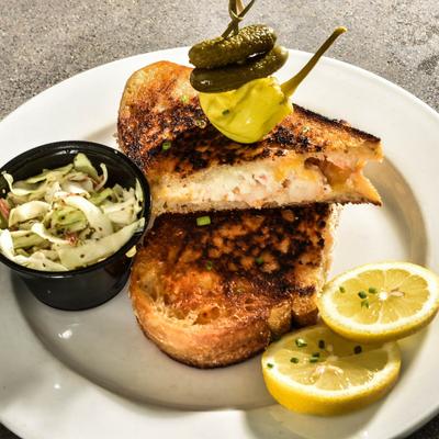 Lobster and Crab Gooey Grilled Cheese Sandwich served with house made coleslaw.