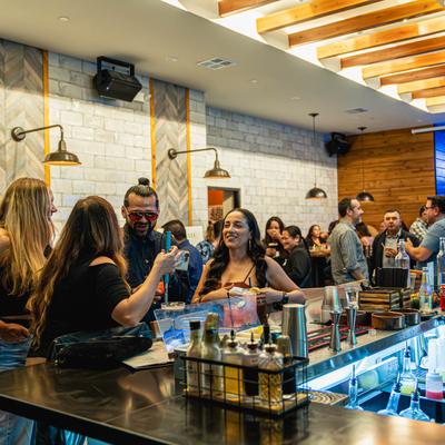 Interior, people at the bar.