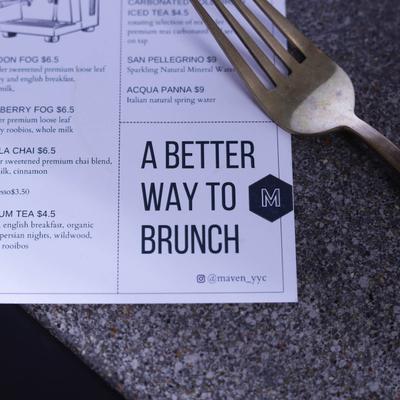 A close-up of a menu featuring drinks and the slogan A Better Way to Brunch.