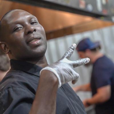 Kitchen staff posing for the camera
