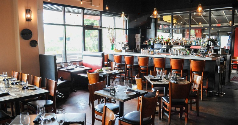 Interior, set tables near a bar