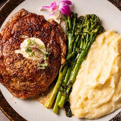14oz certified angus beef, house sauce, chef's daily selection of seasonal sides.