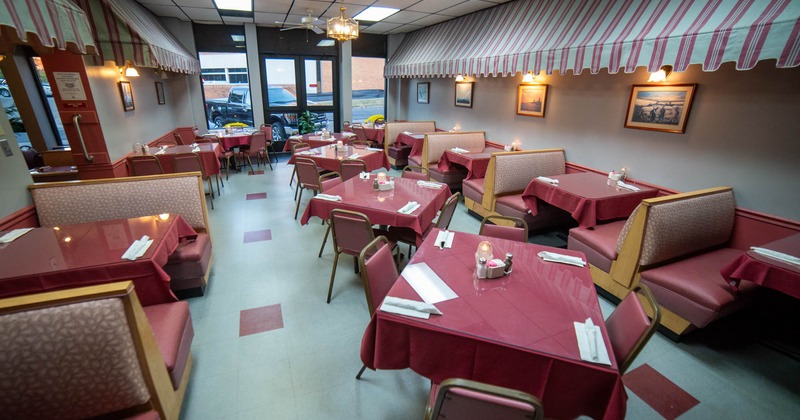 Interior, dining area, tables ready for guests