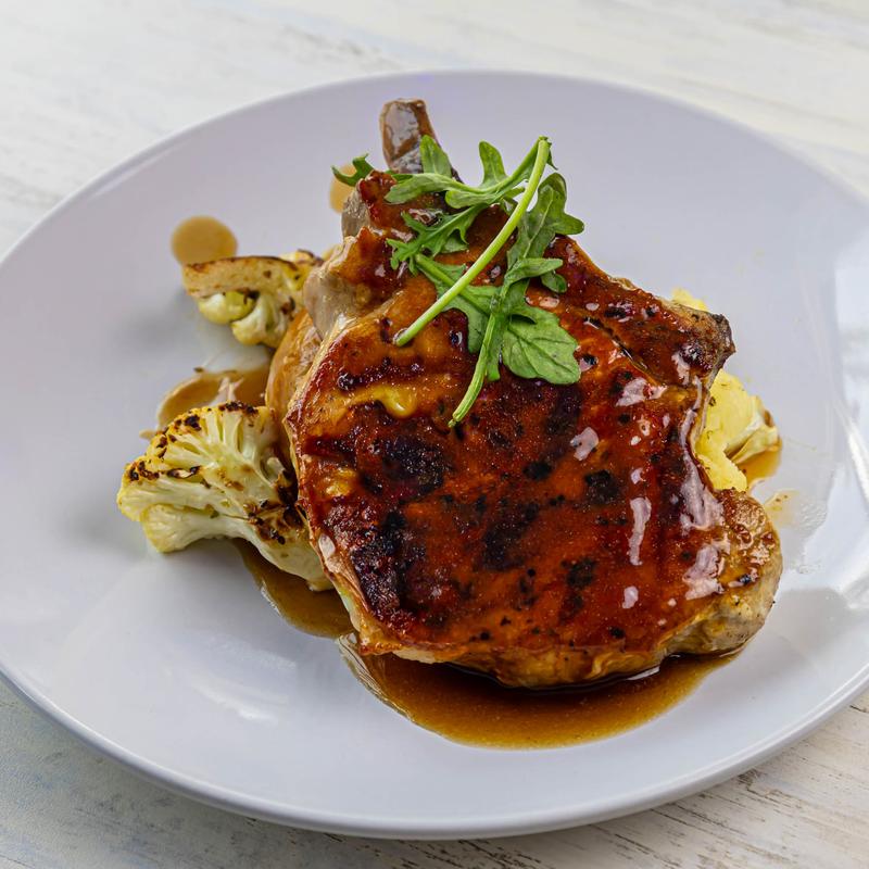 menu item 13 of 14, Grilled Bone Pork Chop with Demi Glaze