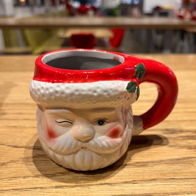 A cup shaped like Santa