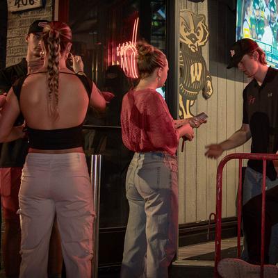 People lining up to enter the venue.