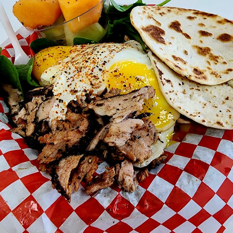 Turkey pastrami with eggs platter photo