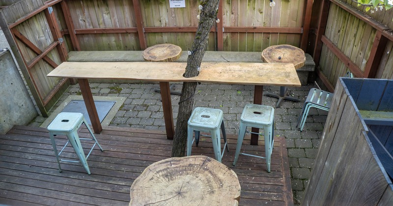 Backyard wooden table and stools