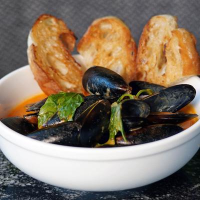 Served mussels in a dish.