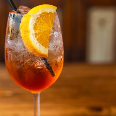 Aperol Spritz with an orange slice.