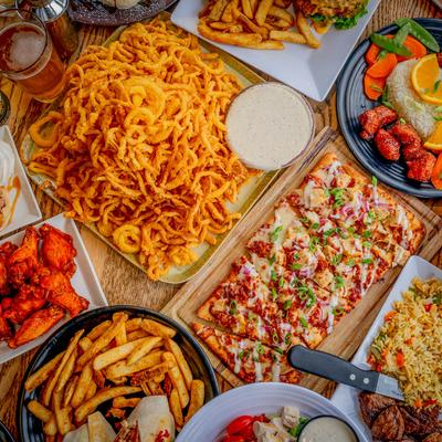 A table spread with a large selection of dishes.