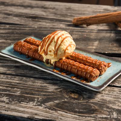 Churros with vanilla ice cream.