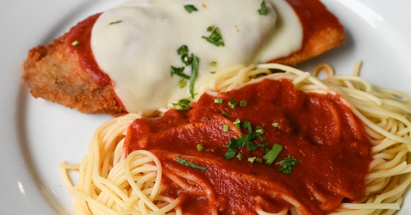 A served Eggplant Parmigiana meal