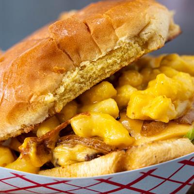 The Smack Burger, smash burger with smash sauce, mac, bacon, and grilled onions.