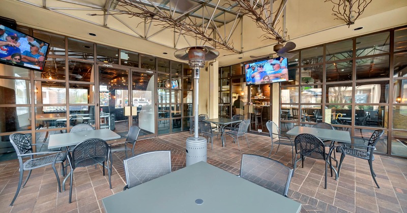 Covered patio area, tables and seats