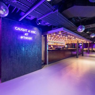 Club Interior - neon lights, neon sign on the wall, part of the bar area