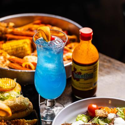 Meals and drinks on the table.