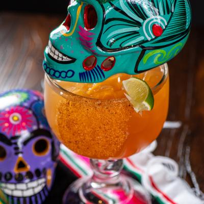Tamarind Margarita cocktail topped with a decorative skull.