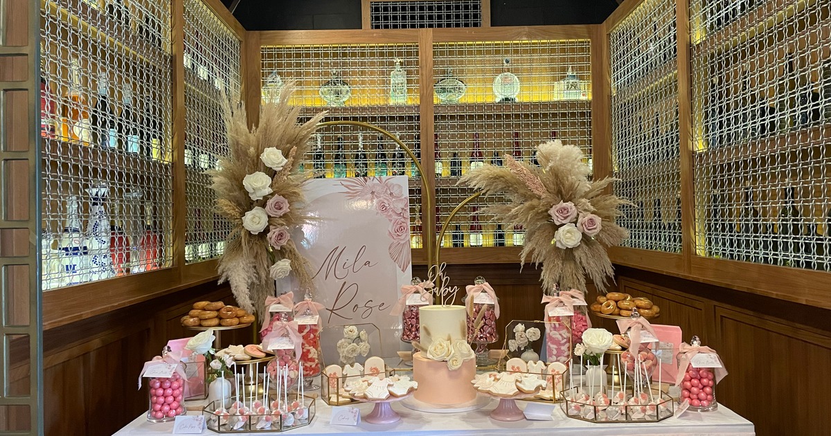 A table adorned with an array of colorful candies and delectable desserts