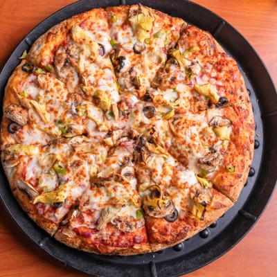 Classic Vegetarian Pizza with mushrooms, olives, peppers and artichoke hearts.