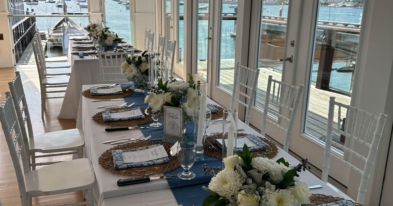 Interior, tables filled with plates and tableware