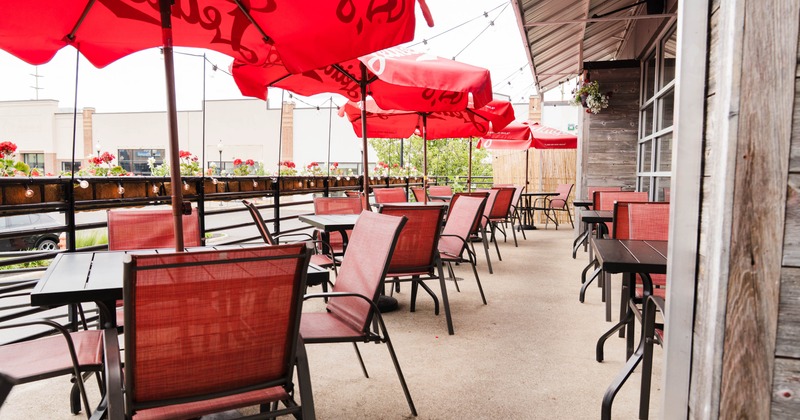 Exterior, patio, seating area, umbrellas