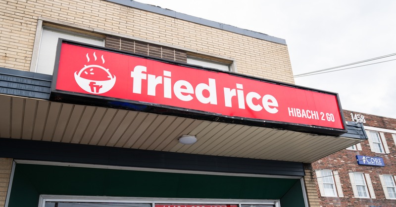 Exterior, front view, sign above the entrance