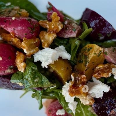 Beet salad with cheese and walnuts.