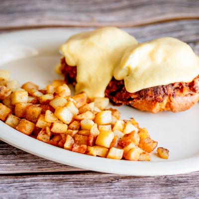 Corn muffin benedict, served.