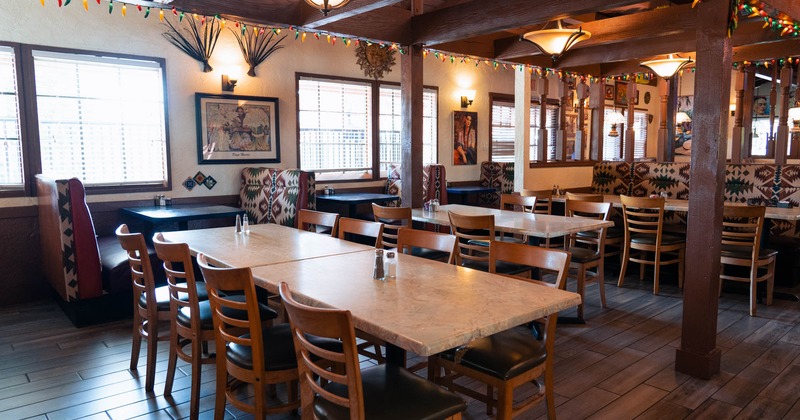 Interior, dining area, marbletop tables with chairs, seating booths, ready for guests