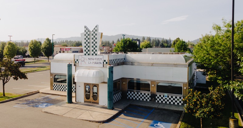 Exterior, aerial view of the restaurant and parking lot