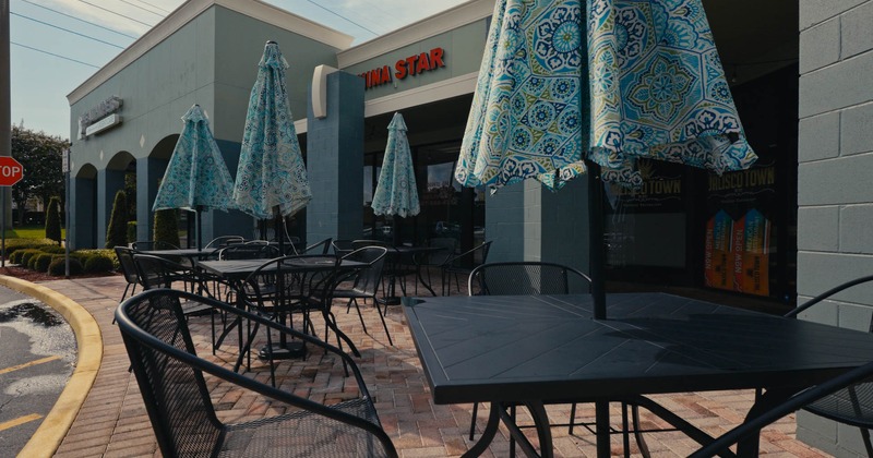 Exterior, chairs and tables with parasols