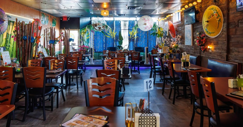 Lively restaurant interior with wooden tables and colorful decor