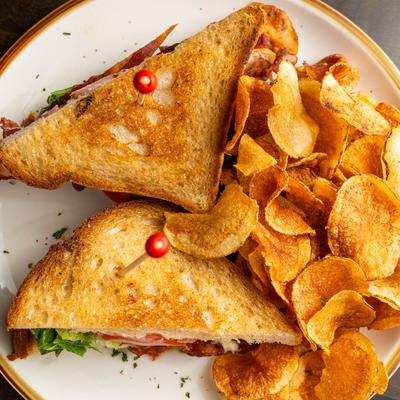 B.L.T. sandwich with crispy potato chips.