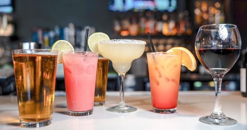 Assortment of drinks on a bar counter