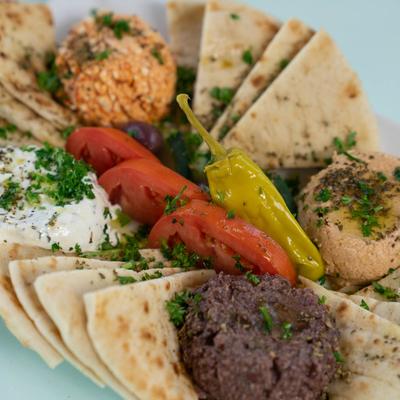 Cold Spread Sampler plate with tzatziki, hummus, olive spread, feta spread and pita