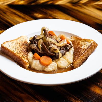 Pot Roast served with mashed potatoes and Texas toast.