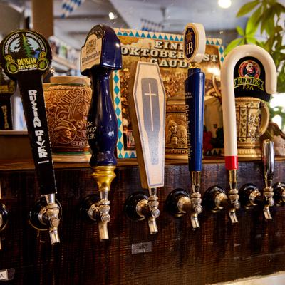A row of beer taps.