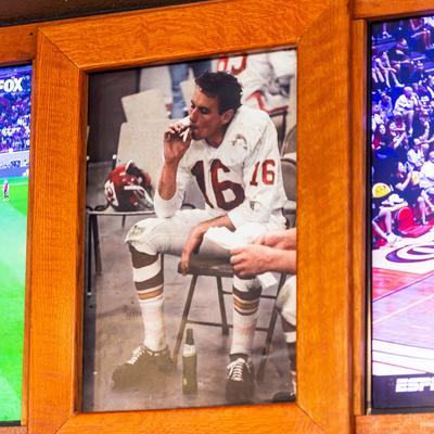 Interior, sportsmen pictures on a wall