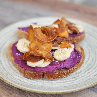Ube Toast with purple sweet potato, banana, sea salt, lavender vanilla honey
