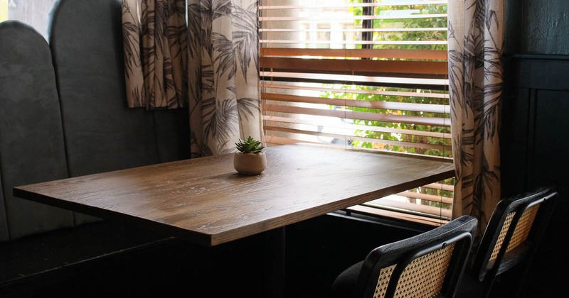 Interior, table and chairs near window