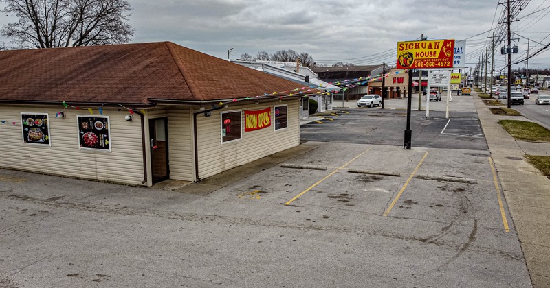 Exterior, aerial view to restaurant and parking lot