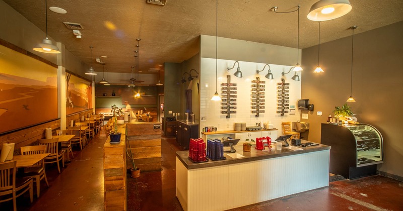 Restaurant interior with a counter and wooden furniture