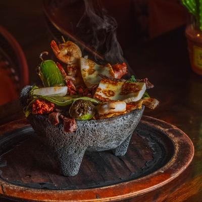 A served Molcajete meal.